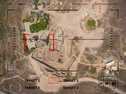 Aerial view through targeting system of ancient ruins.