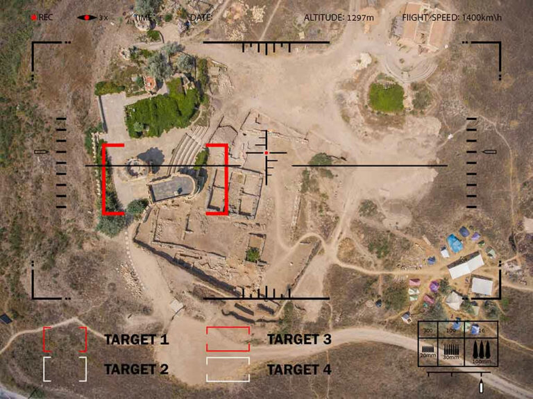 Aerial view through targeting system of ancient ruins.